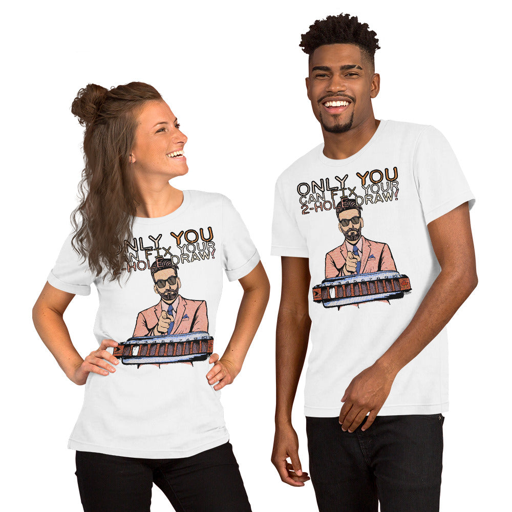 Two models, each wearing the white version of the T-Shirt. The shirt reads, "Only YOU can fix your 2-hole draw!" Under this text is a man in sunglasses and a pink suit and tie, pointing forward, above a harmonica with a blank white space in the 2-hole.